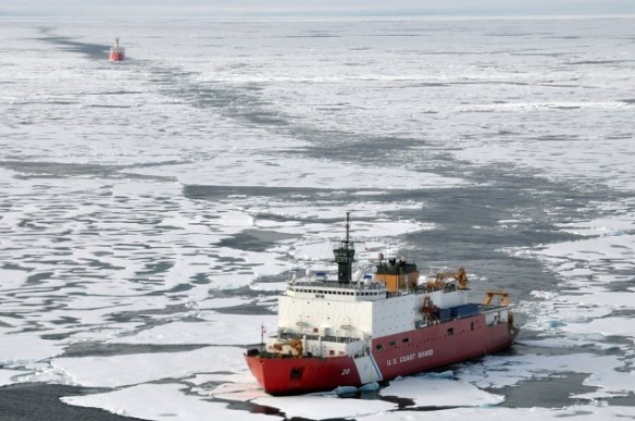 In this Aug. 24, 2009 picture provided by the U.S. Coast Guard, the U.S. Coast Guard Cutter Healy breaks ice ahead of the Canadian Coast Guard Ship Louis S. St-Laurent in the Arctic Ocean. CREDIT: AP PHOTO/U.S. COAST GUARD